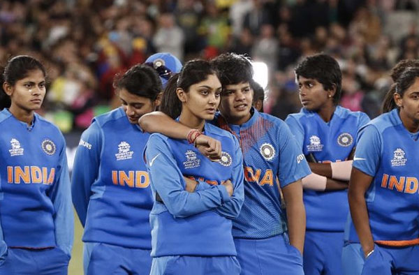 India look dejected after the ICC Women's T20 Cricket World Cup Final match between India and Australia at the Melbourne Cricket Ground on March 08, 2020 in Melbourne, Australia.