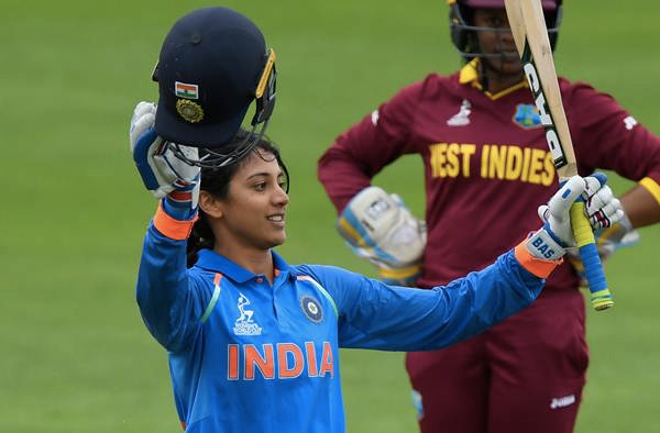 Smriti Mandhana celebrates her century. (Photo by Stu Forster/Getty Images)