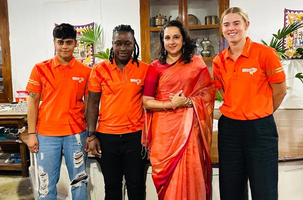 Kashvee Gautam (left), Deandra Dottin, Phoebe Litchfield with the Maharani of Vadodara; PC: Gujarat Giants