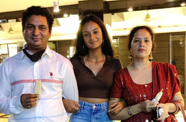 Pratika Rawal with her parents.